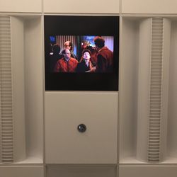 Raul E Escalante DDS MS - Watching Seinfeld while I get my teeth cleaned, remote and headphones