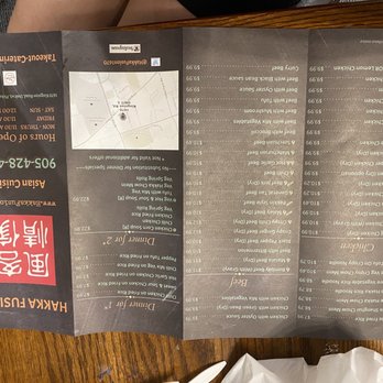 Hakka Fusion - a menu on a wooden table - Hakka Near Me - Pickering, Ontario Hakka Fusion - a menu on a wooden table - Hakka Near Me - Pickering, Ontario
