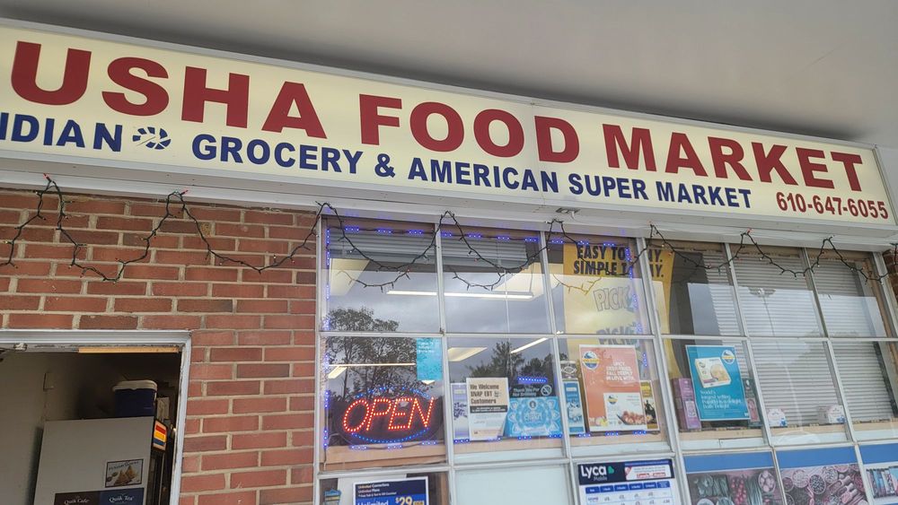Usha Food Market Logo