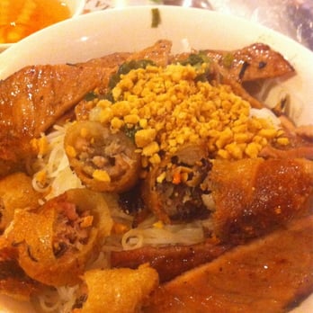 Gia Lam II - spring rolls and grilled thin pork over rice sticks.!! lettuce, cucumbers, and beam sprouts on the bottom of the noodles.. - Vietnamese Near Me - Brooklyn, New York