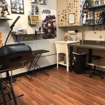 The Shop Tattoo & Comics - Piercing Near Me - Alamosa, Colorado The Shop Tattoo & Comics - Piercing Near Me - Alamosa, Colorado