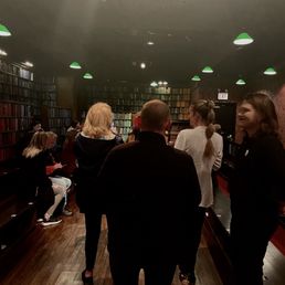 Intimate setting where the actors greet you when entering the stage.