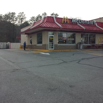 McDonald's - a man standing in front of a mcdonald's - Burgers Near Me - Burgettstown, Pennsylvania McDonald's - a man standing in front of a mcdonald's - Burgers Near Me - Burgettstown, Pennsylvania