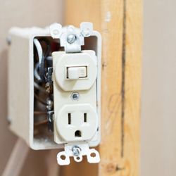 Light House Electrical Contractors - Installed new light switch/outlet combo.