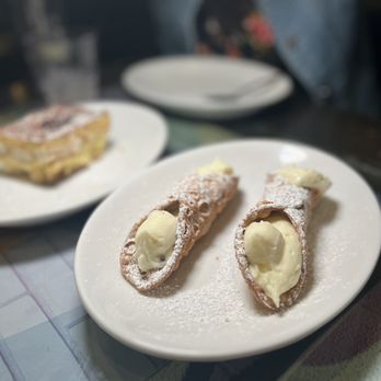 Nunzi's by the Water - two desserts on plates - Italian Near Me - Freeport, New York Nunzi's by the Water - two desserts on plates - Italian Near Me - Freeport, New York