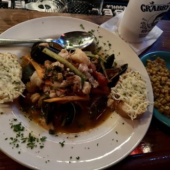 Jacques-Imo's Cafe - Seafood bouillabaisse with a side of corn and cabbage - Cajun/Creole Near Me - New Orleans, Louisiana Jacques-Imo's Cafe - Seafood bouillabaisse with a side of corn and cabbage - Cajun/Creole Near Me - New Orleans, Louisiana