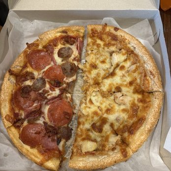 Singas Famous Pizza - Left meat lovers, Right is Chicken Tikka Masala. - Pizza Near Me - Camp Hill, Pennsylvania Singas Famous Pizza - Left meat lovers, Right is Chicken Tikka Masala. - Pizza Near Me - Camp Hill, Pennsylvania
