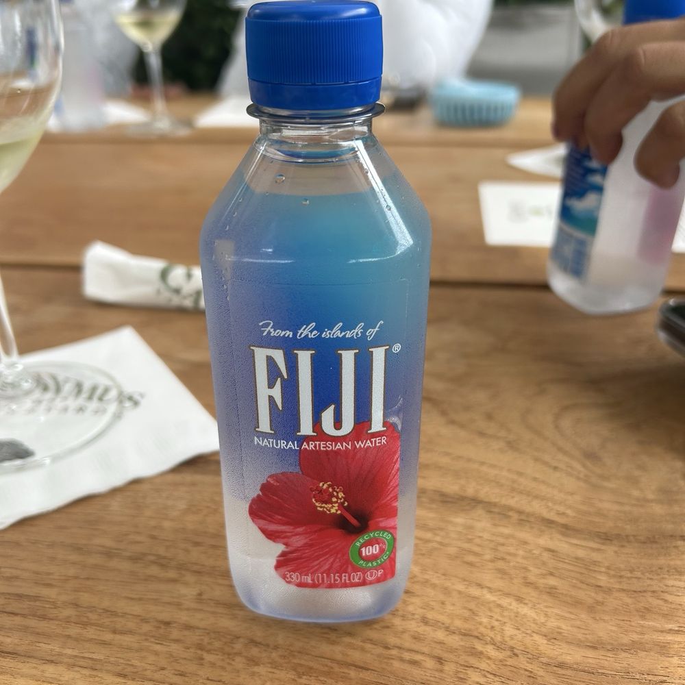 Caymus Vineyards - Complimentary Fiji water - Wineries Near Me - Rutherford, California