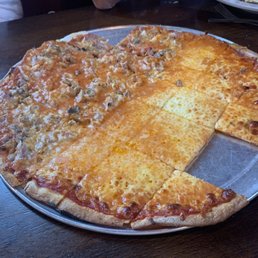 a pizza with a slice taken out of it a pizza with a slice taken out of it