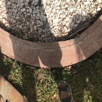 Plus Eight Design - the shadow of a person standing in front of a planter - Masonry/Concrete Near Me - Houston, Texas
