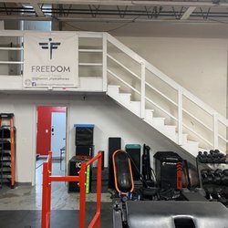 Peak Performance & Rehab - Stairs leading up to treatment room