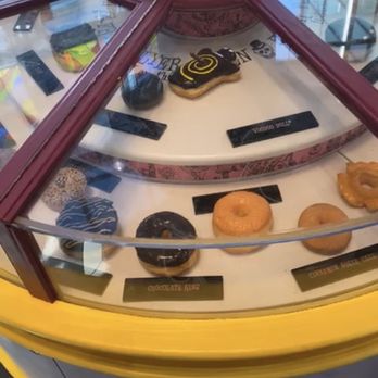 Voodoo Doughnut - Spinning donut display! - Bakeries Near Me - Orlando, Florida Voodoo Doughnut - Spinning donut display! - Bakeries Near Me - Orlando, Florida