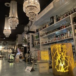 chandeliers and bottles of liquor
