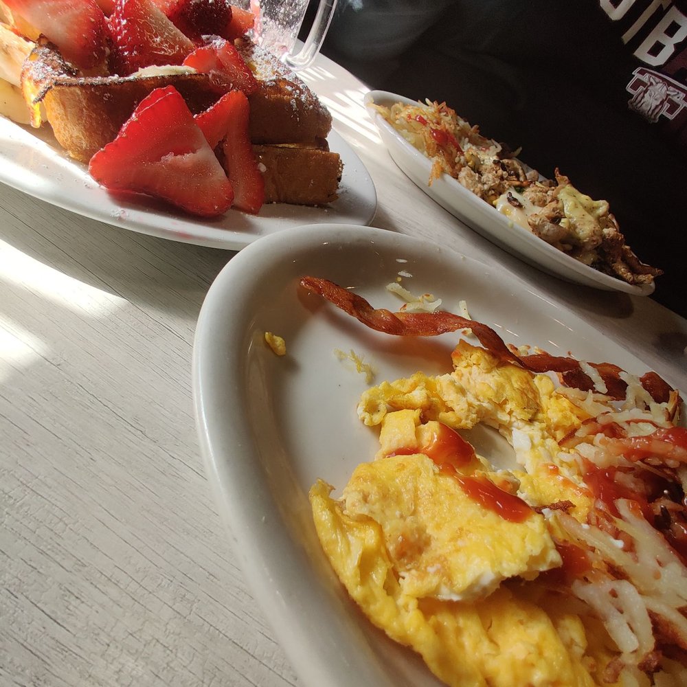 Loaded Cafe - Long Beach - Strawberry banana French toast and dry scrambled eggs with hash browns. In the back, a super stacker that the hubby said was good. - American Near Me - Long Beach, California Loaded Cafe - Long Beach - Strawberry banana French toast and dry scrambled eggs with hash browns. In the back, a super stacker that the hubby said was good. - American Near Me - Long Beach, California