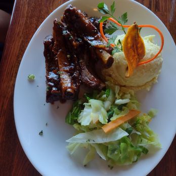 Mo Bay Grill - Half Rack of Ribs with Mashed Sweet Potatoes - Caribbean Near Me - Sebastian, Florida Mo Bay Grill - Half Rack of Ribs with Mashed Sweet Potatoes - Caribbean Near Me - Sebastian, Florida