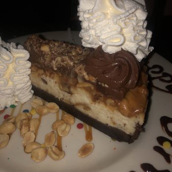 The Cheesecake Factory - Chocolate Caramelicious Cheesecake Made with Snickers - American Near Me - Oxnard, California The Cheesecake Factory - Chocolate Caramelicious Cheesecake Made with Snickers - American Near Me - Oxnard, California
