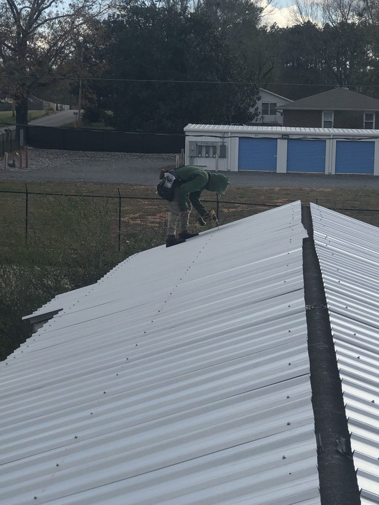 Slide of E & S Roofing