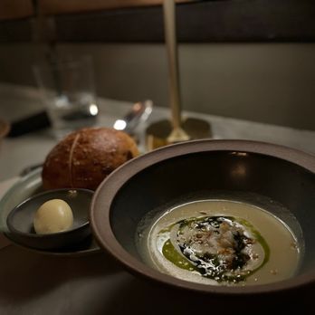 Sixty Three Clinton - a bowl of soup and a loaf of bread - New American Near Me - New York, New York
