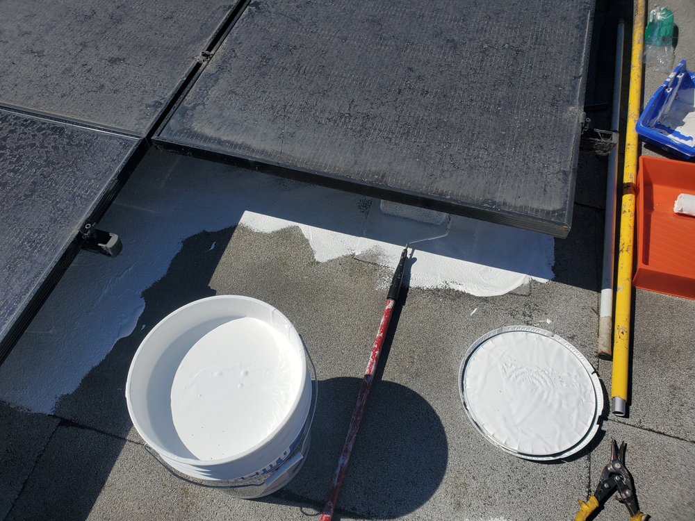 Slide of Mikes Roofing