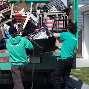 505-Junk - Two 505-Junk employees carrying junk into the back of the truck. - Junk Removal & Hauling Near Me - Richmond, British Columbia 505-Junk - Two 505-Junk employees carrying junk into the back of the truck. - Junk Removal & Hauling Near Me - Richmond, British Columbia
