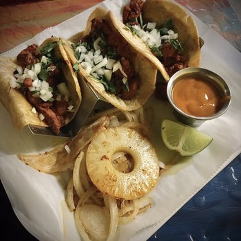 Santa Fe Bar & Grill - Tacos al pastor (pork) with cooked onions, a grilled pineapple slice, and mild chipotle sauce. - Mexican Near Me - Mountain Grove, Missouri