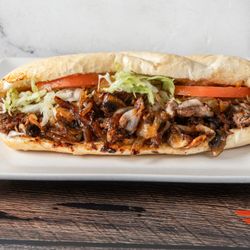 The Steakout - Teriyaki Twist- Ribeye steak, onions, provolone cheese, teriyaki glaze