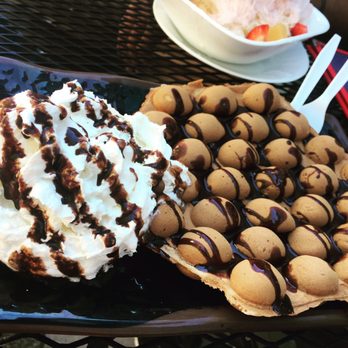 Cafe O'Dessert - Chocolate egg waffle with whip cream and chocolate sauce pretty good could be just a tiny bit crispier - Desserts Near Me - Seattle, Washington