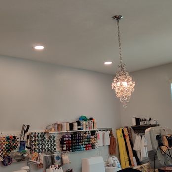 Dodge Electric - View from corner of room showing three of the installed lights with the chandelier - Electricians Near Me - Chandler, Arizona Dodge Electric - View from corner of room showing three of the installed lights with the chandelier - Electricians Near Me - Chandler, Arizona