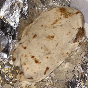 Chacho's Mexican Restaurant - Bean & Cheese Burrito (I accidentally dropped the box that's why there's a tear in the tortilla) - Mexican Near Me - Houston, Texas Chacho's Mexican Restaurant - Bean & Cheese Burrito (I accidentally dropped the box that's why there's a tear in the tortilla) - Mexican Near Me - Houston, Texas