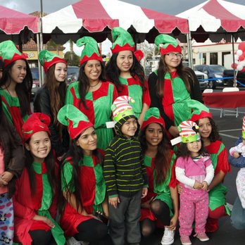 Anaheim Town Square - Santa's elves are available for photo ops on the last Sunday in November. - Shopping Centers Near Me - Anaheim, California