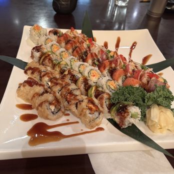 Sushi Zen - 5 rolls from left to right - Crazy Boy Roll, Dragon Roll, Spicy California Roll, Brighton Roll, Ruby Roll - Sushi Bars Near Me - Brighton, Michigan Sushi Zen - 5 rolls from left to right - Crazy Boy Roll, Dragon Roll, Spicy California Roll, Brighton Roll, Ruby Roll - Sushi Bars Near Me - Brighton, Michigan