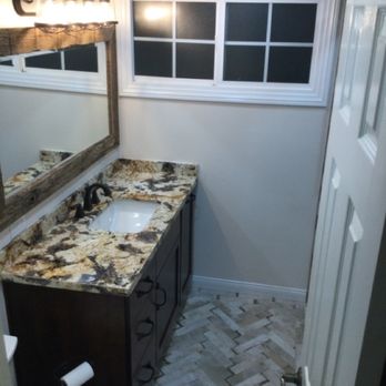 Cabinet Magic - Vanity lights, reclaimed barn wood frame mirror, granite counter, Kohler sink, faucet and toilet, Havana sugar tile - General Contractors Near Me - La Habra, California Cabinet Magic - Vanity lights, reclaimed barn wood frame mirror, granite counter, Kohler sink, faucet and toilet, Havana sugar tile - General Contractors Near Me - La Habra, California