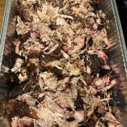Slicen Dyson Smoked Meats - A tray of Victory Pulled Pork Butt