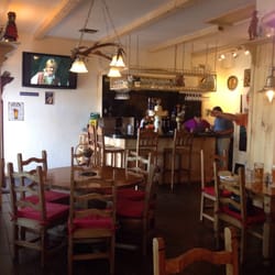 The German Deli and Jagerstuble - About 10 tables and a couple seats at the bar with an awesome little deli next door.