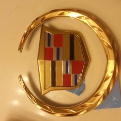 24K Gold Plating Solutions - Cadilac Wreath and emblem finished.