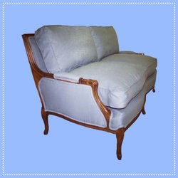 Abracadabra Upholstery Studio - Antique settee with feather filled cushions.