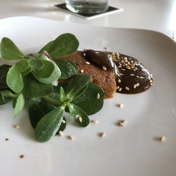Xochi - Pan de Mole- lil cornbread hidin under the leaves. - Mexican Near Me - Houston, Texas Xochi - Pan de Mole- lil cornbread hidin under the leaves. - Mexican Near Me - Houston, Texas
