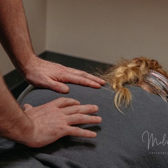 Plainfield Spine And Rehabilitation, Dr. McCarthy Chiropractor - Dr. Paul McCarthy adjusting a patient - Chiropractors Near Me - Plainfield, Illinois