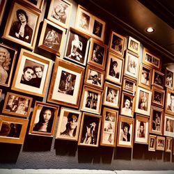 The walls are covered with stunning photographs of music legends