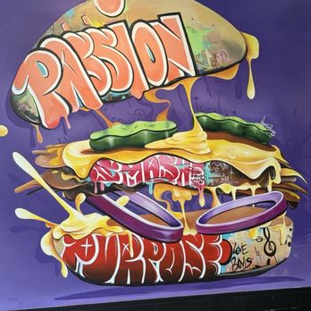 Cow & Cheese - Dining area wall - Burgers Near Me - Winter Park, Florida