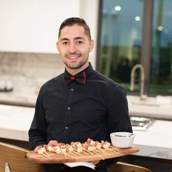PartyTap - Kevin serving prosciutto and cheese bites.