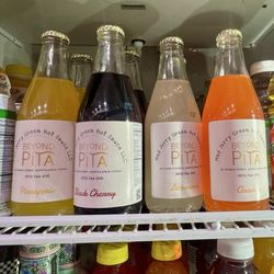 Beyond Pita now manufactures its own soda. They have pineapple, black cherry, lemonade, and orange flavors!