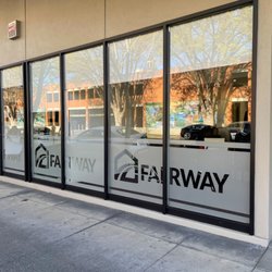 Etched glass and privacy film enhance storefront windows with professional branding while maintaining a clean appearance.