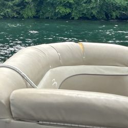 Ripped up upholstery. The whole boat looked like this. We wish we took pictures of all the missing screws, trapped up parts, and dents.