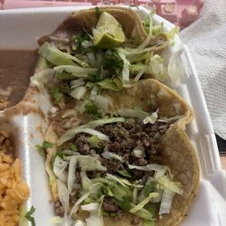 Brasas - After I took the lettuce off. The other taco I didn't touch, u can't even see the meat.