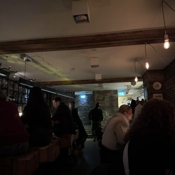 Bar St Lo - inside infront of bar and tables - Bars Near Me - Toronto, Ontario