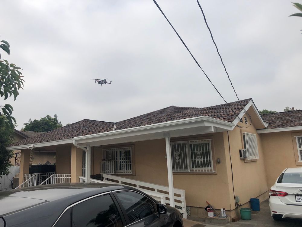 Slide of Economy Roofing & Construction