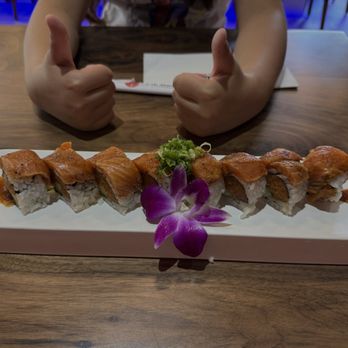 Sapporo Sushi - Amigos roll - moderately spicy and very unique. Loved the Cajun sauce on the salmon. Highly recommend. - Japanese Near Me - San Marcos, California