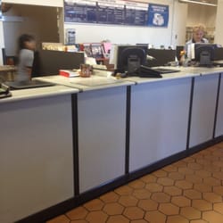 US Post Office - Standard post office. They have boxes and envelopes of all sorts of sizes too. Overpriced, but helpful for the forgetful.