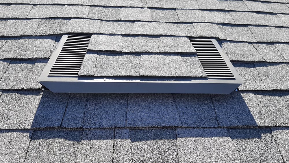 Slide of El Puma Roofing